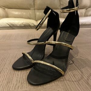 bebe Black Sandals with Gold Metallic Straps
